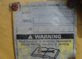 A Cat Caterpillar Warning Label With Model Number