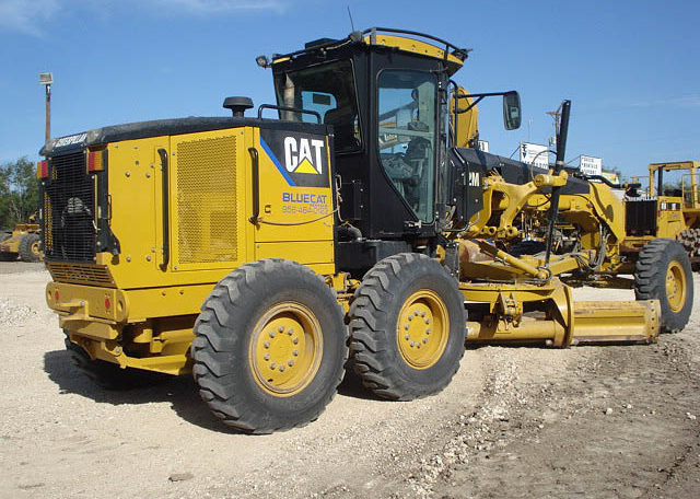 A Yellow Color Crane WIth Big Wheels