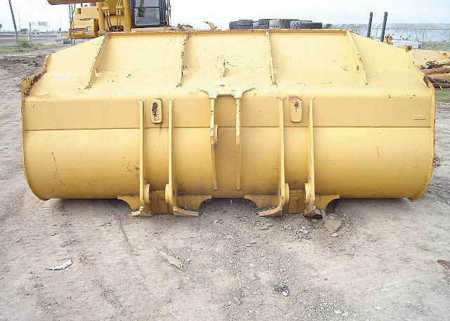 The Back of a Bulldozer Claw With Yellow Paint