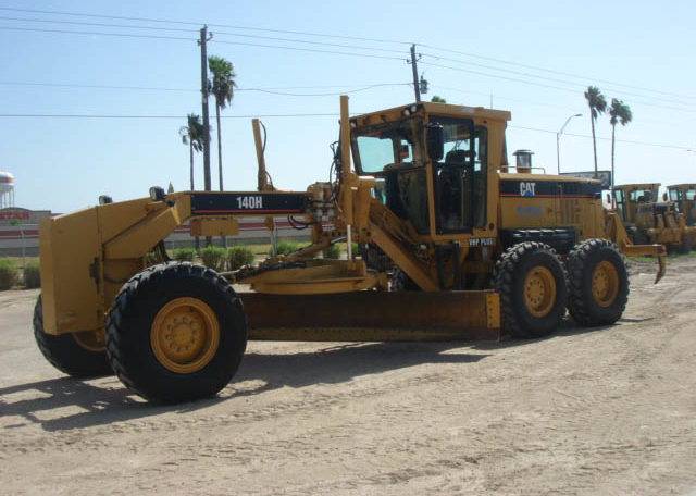 A Yellow Color Truck WIth a SOil Digging Tool Rotates