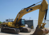 A Yellow Color Claw Arm of a Cat Excavator in Dark Side