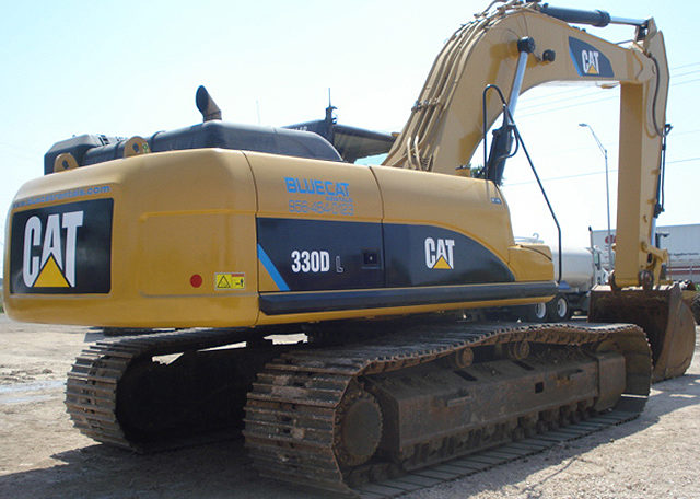A Yellow Color Claw Arm of a Cat Excavator in Dark Side Back