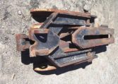 A Rusted Mechanical Thumb on Ground Top