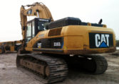 An Excavator With Claw Resting on the Ground Back