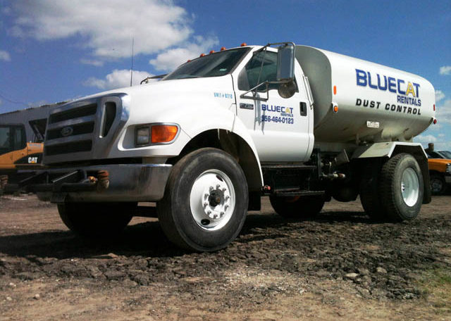 A Blue Cat Water Truck Front Side View One