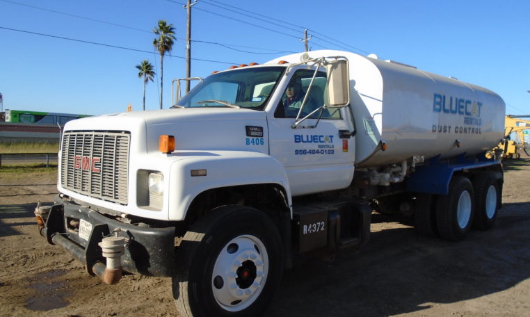 A GMC Heavy Duty Water Truck in White Front