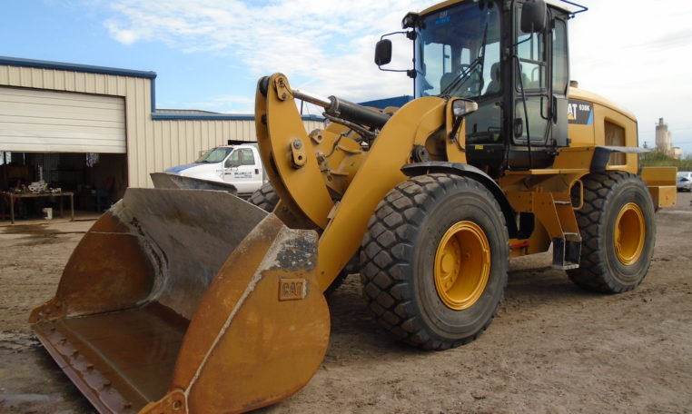 A Bulldozer in Yellow Color on a Mud Surface