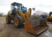 A Yellow Color Bulldozer in Parking
