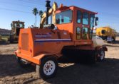 An Orange Color Heavy Vehicle Truck