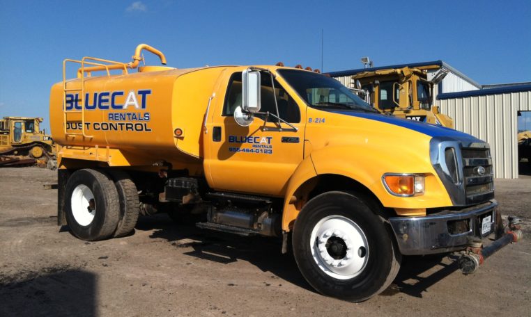 A Yellow Color Blue Cat Water Truck