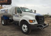 A White Color Blue Cat Water Truck Side View