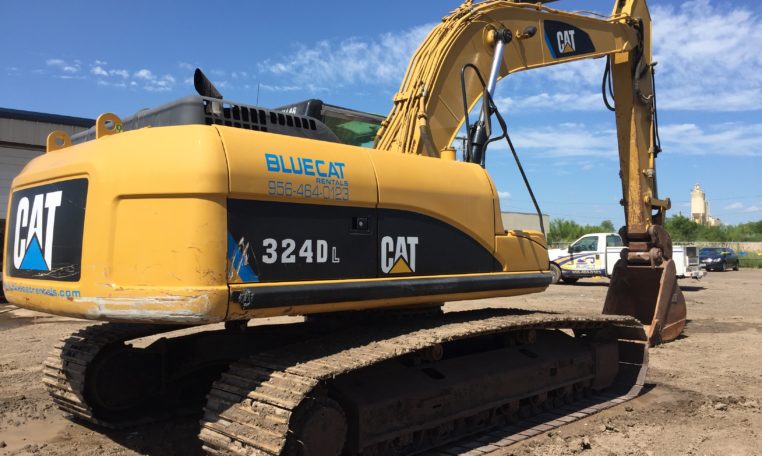 The Back View of a Cat Branding Excavator