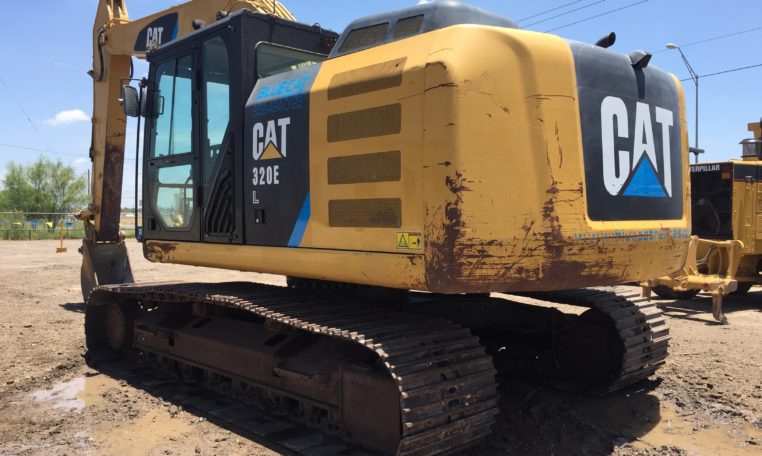 A Cat Excavator in Yellow Color Back View